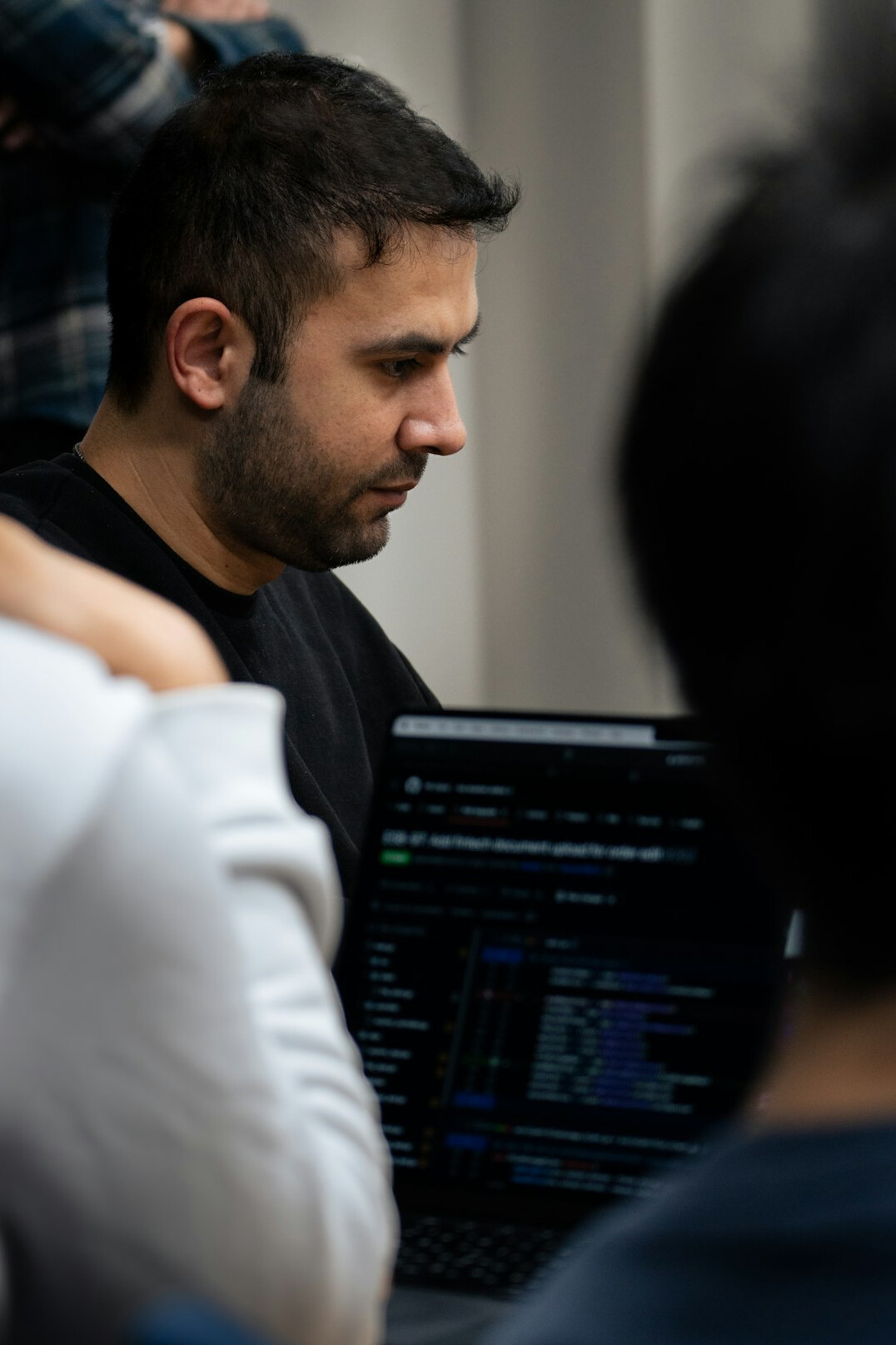 person learning to code on laptop